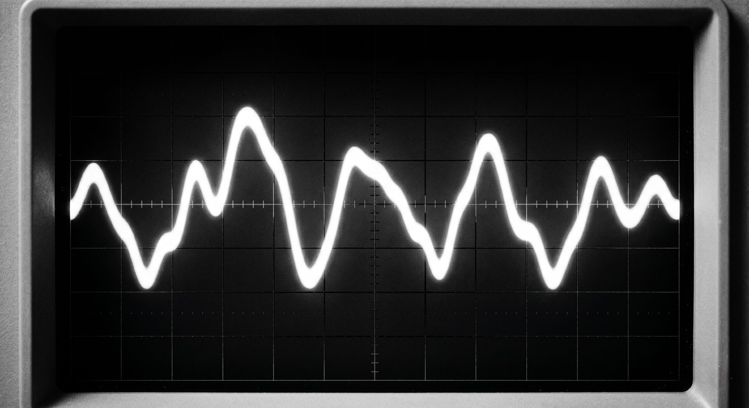 Forensic seismograph readout displaying the low-frequency infrasound waves related to The Worldwide Hum.